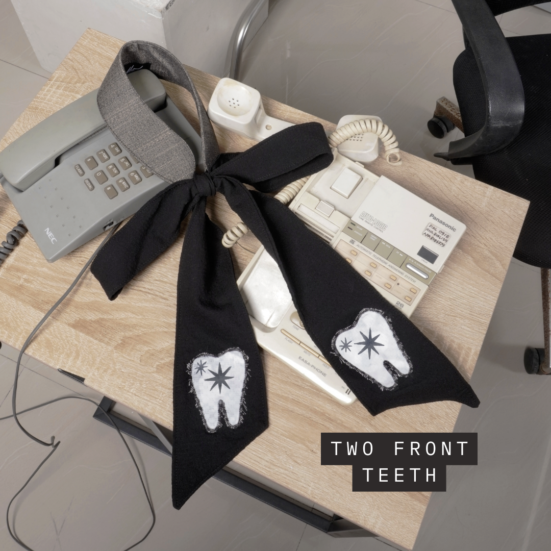 Secretary Bow - TWO FRONT TEETH š¦·